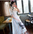 Conjunto de dos piezas con cuello mandarín y mangas casquillo Vestido floral Ao Dai