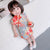 Vestido cheongsam infantil de algodón floral con cuello mandarín y mangas casquillo