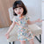 Vestido cheongsam infantil de algodón floral con cuello mandarín y mangas casquillo