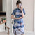 Mini-robe Cheongsam moderne à motif floral et grues de grande taille