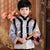 Traje acolchado para niño estilo chino con cuello de piel de brocado con patrón de grúas
