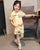 Abito cinese tradizionale da ragazza con top e pantaloni corti cheongsam