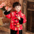 Traje acolchado de niño de estilo chino tradicional con borde de piel de brocado con patrón de dragón