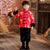 Traje acolchado de niño de estilo chino tradicional con borde de piel de brocado con patrón de dragón