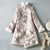 Manteau coupe-vent moulant de style chinois avec col en fourrure de brocart floral