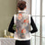 Gilet gilet stile cinese in pelle scamosciata floreale con bordo in pelliccia
