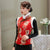 Chaleco de estilo chino de brocado floral con cuello de piel y puños