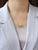 Radförmige weiße Jade-Anhänger-Vergoldungs-Halskette