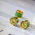 Collar dorado con colgante de jade verde en forma de rueda