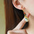 Boucles d'oreilles en forme de goutte d'eau de style chinois en jade blanc