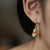 Vergoldete Ohrringe in Kürbisform, Türkis im chinesischen Stil