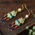 Pendientes dorados estilo chino de jade y cloisonné con borlas