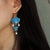 Boucles d'oreilles en dorure de style chinois cloisonné en forme de papillon et floral