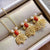 Pendientes dorados de estilo chino de ágata roja con forma de pez dorado