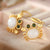 Boucles d'oreilles en forme de crabe en jade blanc style chinois doré