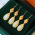 Vergoldung Gebetsmühle & weiße Jade Ohrringe im chinesischen Stil