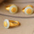 Carattere Fu dorato e anello in argento in stile cinese con giada bianca