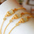 Bracciale in stile cinese con ciondolo in giada bianca e dorato Pi Xiu