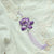 Broderie en forme de lotus avec broche de dorure à pampilles