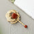 Broche Motif Phénix Argent & Corail Rouge Dorée