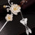 Horquilla estilo chino retro de plata esterlina con diseño de flor de jade con borla de mariposa