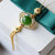 Colgante de jade verde con forma de linterna y collar dorado de borlas