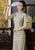 Schickes, knielanges Cheongsam-Karo-Karo-chinesisches Kleid
