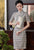 Halbärmeliges, knielanges Cheongsam-Karo-Karo-chinesisches Kleid