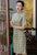 Halbärmeliges, knielanges Cheongsam-Karo-Karo-chinesisches Kleid