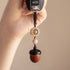 Sandalwood Acorn Car Key Pendant with Crystals in It