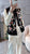 Chaleco de estilo chino grueso con bordado floral con borde de piel