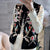 Chaleco de estilo chino grueso con bordado floral con borde de piel